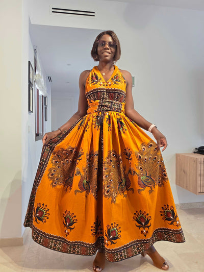 Model wearing the GOLDEN PEACOCK Infinity Strap Dress