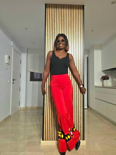 BINTA SAMBA Signature Pants front view – wide-leg tailored pants with African print hem